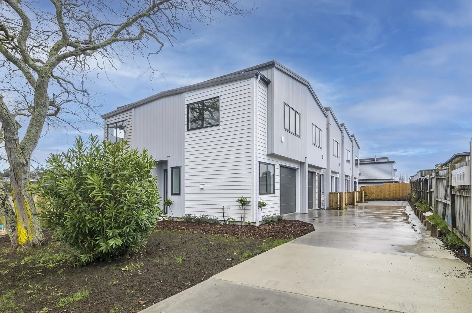 13 Ranch Avenue townhouses in Beach Haven, Auckland — exterior view