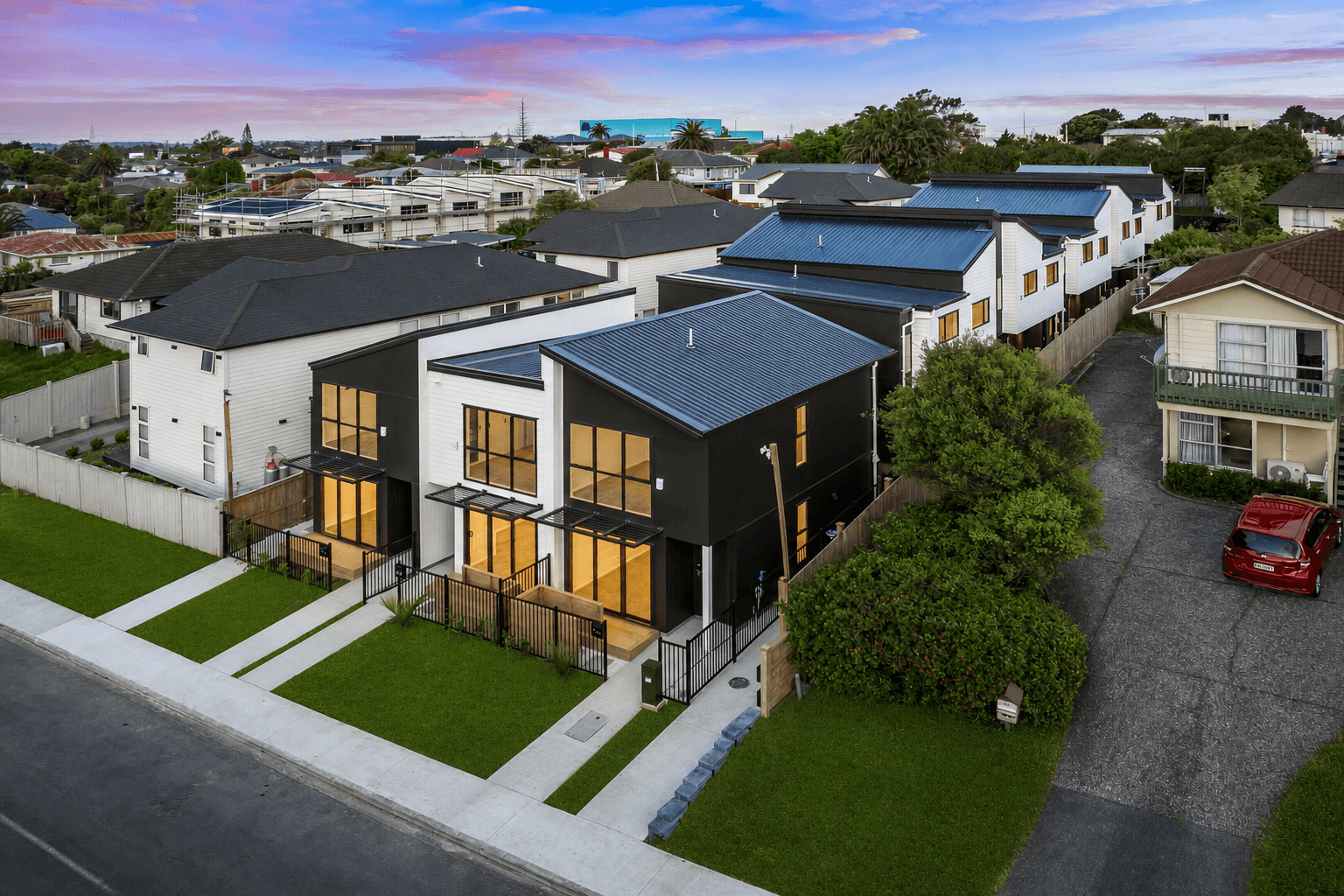 Enhanced exterior image of Tudor Residences townhouses built by Creston Property, Auckland.
