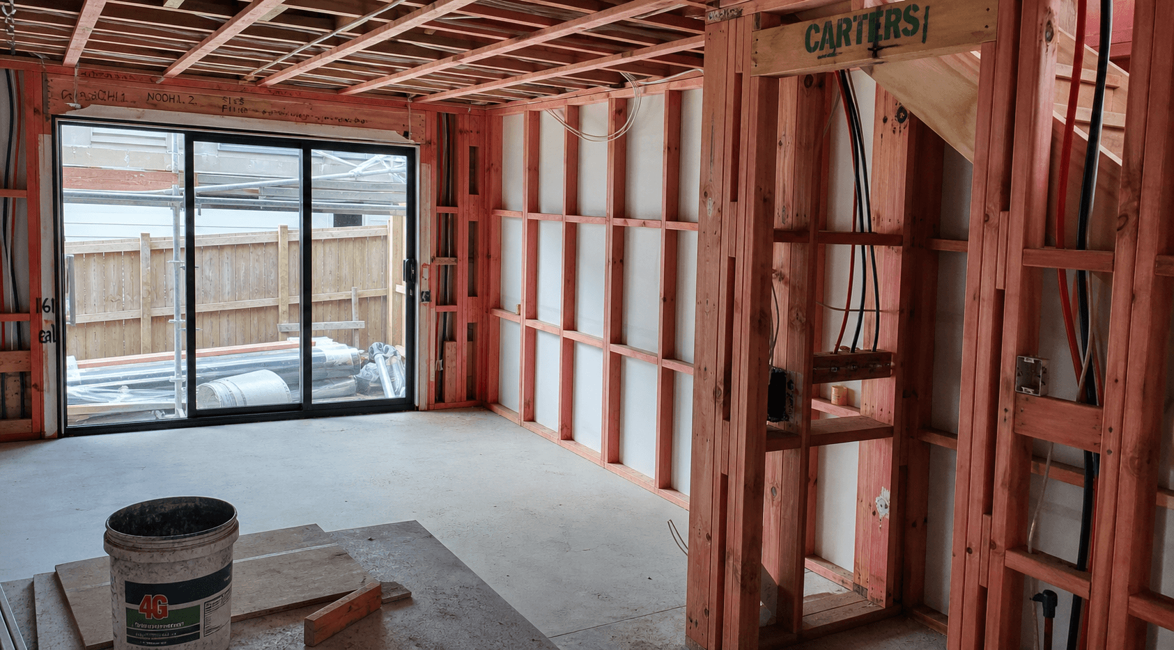 Interior timber framing during construction of a Tudor Residences townhouse